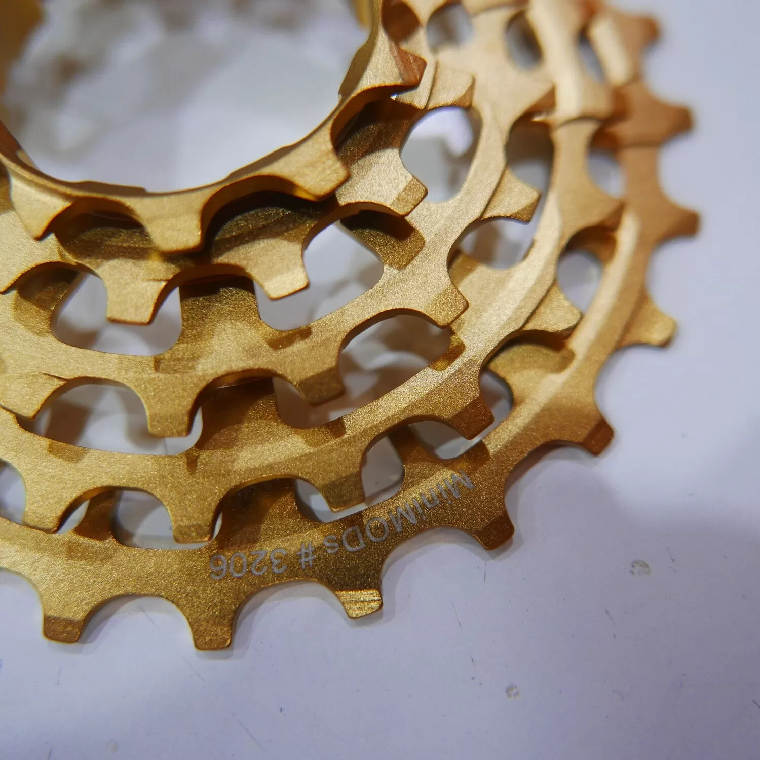 Bộ líp 5 số MiniMODs X5 Unibody Cog Set - Gold